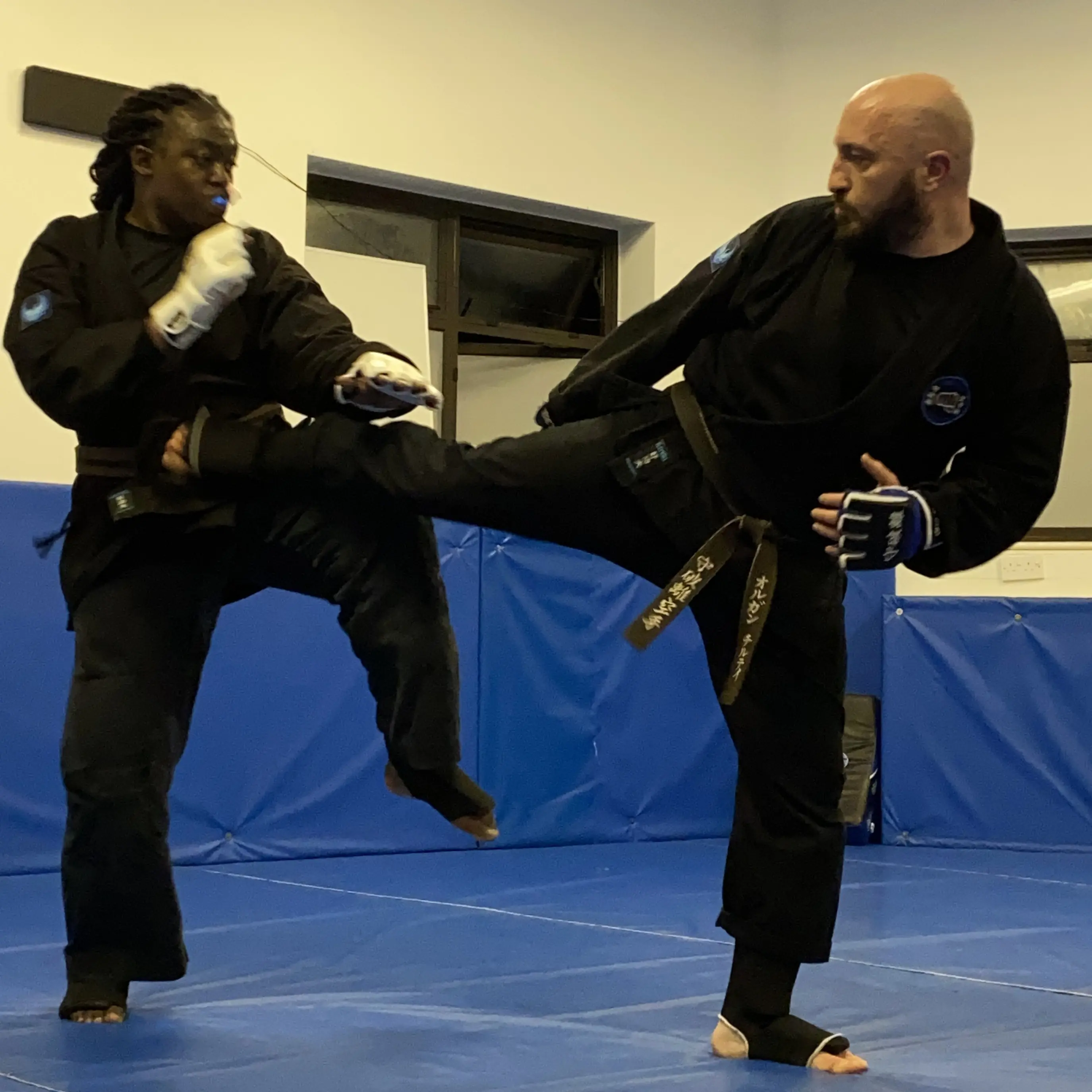 Olgun Tiltay of  Shuhari Self Defence sparring in a karate class in Slough